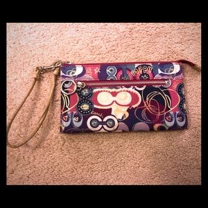 Purple and pink Coach wallet/wristlet